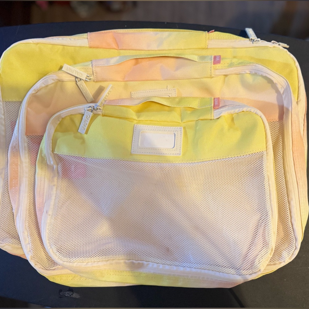 Calpak Pastel Yellow and Pink Packing Cubes